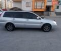 Сірий Міцубісі Lancer, об'ємом двигуна 1.58 л та пробігом 258 тис. км за 2999 $, фото 6 на Automoto.ua