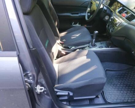 Серый Мицубиси Лансер, объемом двигателя 1.6 л и пробегом 178 тыс. км за 4000 $, фото 7 на Automoto.ua