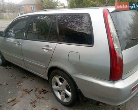 Серый Мицубиси Лансер, объемом двигателя 1.6 л и пробегом 350 тыс. км за 3000 $, фото 5 на Automoto.ua