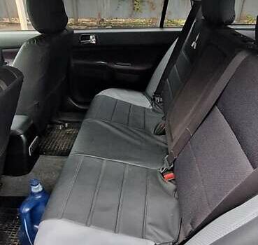 Серый Мицубиси Лансер, объемом двигателя 1.58 л и пробегом 223 тыс. км за 3200 $, фото 11 на Automoto.ua