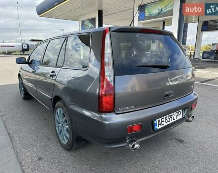 Сірий Міцубісі Lancer, об'ємом двигуна 1.59 л та пробігом 279 тис. км за 4999 $, фото 14 на Automoto.ua