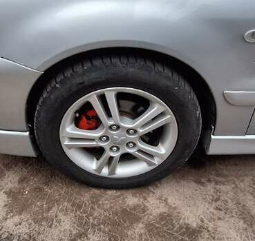 Серый Мицубиси Лансер, объемом двигателя 1.58 л и пробегом 223 тыс. км за 3200 $, фото 8 на Automoto.ua