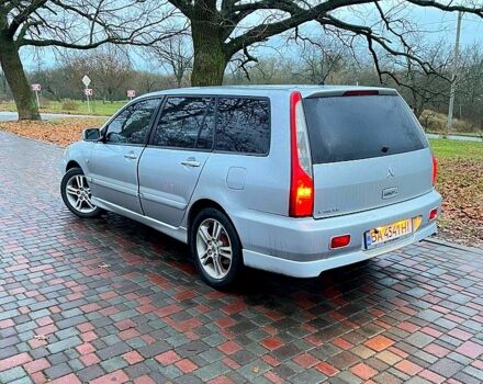 Серый Мицубиси Лансер, объемом двигателя 2 л и пробегом 346 тыс. км за 3900 $, фото 2 на Automoto.ua