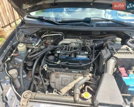 Сірий Міцубісі Lancer, об'ємом двигуна 1.6 л та пробігом 279 тис. км за 5800 $, фото 23 на Automoto.ua
