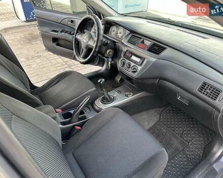 Сірий Міцубісі Lancer, об'ємом двигуна 1.59 л та пробігом 279 тис. км за 4999 $, фото 34 на Automoto.ua