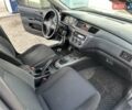 Сірий Міцубісі Lancer, об'ємом двигуна 1.59 л та пробігом 279 тис. км за 4999 $, фото 34 на Automoto.ua