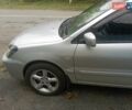 Сірий Міцубісі Lancer, об'ємом двигуна 1.6 л та пробігом 350 тис. км за 4000 $, фото 9 на Automoto.ua