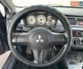 Сірий Міцубісі Lancer, об'ємом двигуна 1.59 л та пробігом 279 тис. км за 4999 $, фото 24 на Automoto.ua