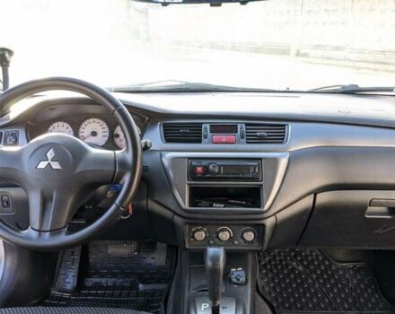 Сірий Міцубісі Lancer, об'ємом двигуна 1.58 л та пробігом 220 тис. км за 4499 $, фото 27 на Automoto.ua