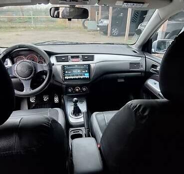 Серый Мицубиси Лансер, объемом двигателя 1.58 л и пробегом 223 тыс. км за 3200 $, фото 12 на Automoto.ua