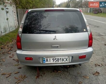 Серый Мицубиси Лансер, объемом двигателя 1.6 л и пробегом 350 тыс. км за 3000 $, фото 6 на Automoto.ua