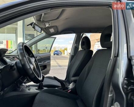 Сірий Міцубісі Lancer, об'ємом двигуна 1.59 л та пробігом 279 тис. км за 4999 $, фото 21 на Automoto.ua