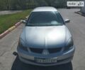 Сірий Міцубісі Lancer, об'ємом двигуна 2 л та пробігом 242 тис. км за 3750 $, фото 1 на Automoto.ua
