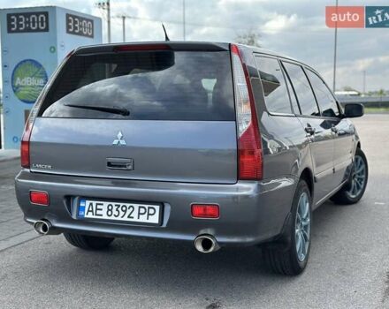 Сірий Міцубісі Lancer, об'ємом двигуна 1.59 л та пробігом 279 тис. км за 4999 $, фото 1 на Automoto.ua