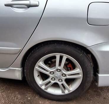 Серый Мицубиси Лансер, объемом двигателя 1.58 л и пробегом 223 тыс. км за 3200 $, фото 3 на Automoto.ua