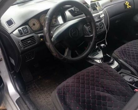 Серый Мицубиси Лансер, объемом двигателя 1.6 л и пробегом 350 тыс. км за 3000 $, фото 4 на Automoto.ua