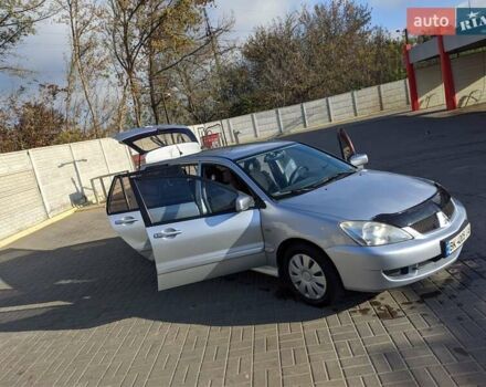 Сірий Міцубісі Lancer, об'ємом двигуна 1.58 л та пробігом 220 тис. км за 4499 $, фото 23 на Automoto.ua
