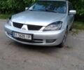 Сірий Міцубісі Lancer, об'ємом двигуна 1.6 л та пробігом 300 тис. км за 3918 $, фото 1 на Automoto.ua