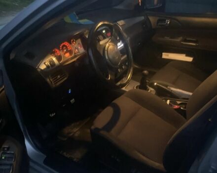 Серый Мицубиси Лансер, объемом двигателя 2 л и пробегом 250 тыс. км за 4058 $, фото 5 на Automoto.ua