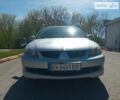 Серый Мицубиси Лансер, объемом двигателя 2 л и пробегом 242 тыс. км за 3600 $, фото 9 на Automoto.ua