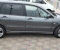 Сірий Міцубісі Lancer, об'ємом двигуна 2 л та пробігом 217 тис. км за 4600 $, фото 2 на Automoto.ua