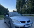Сірий Міцубісі Lancer, об'ємом двигуна 1.6 л та пробігом 167 тис. км за 3800 $, фото 1 на Automoto.ua