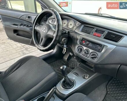 Сірий Міцубісі Lancer, об'ємом двигуна 1.59 л та пробігом 279 тис. км за 4999 $, фото 36 на Automoto.ua