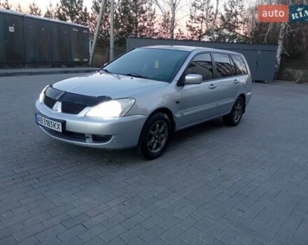 Сірий Міцубісі Lancer, об'ємом двигуна 1.58 л та пробігом 258 тис. км за 2999 $, фото 1 на Automoto.ua