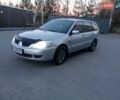 Сірий Міцубісі Lancer, об'ємом двигуна 1.58 л та пробігом 258 тис. км за 2999 $, фото 1 на Automoto.ua