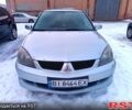 Сірий Міцубісі Lancer, об'ємом двигуна 1.6 л та пробігом 160 тис. км за 4700 $, фото 1 на Automoto.ua