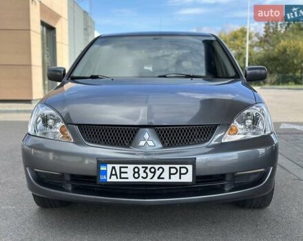 Сірий Міцубісі Lancer, об'ємом двигуна 1.59 л та пробігом 279 тис. км за 4999 $, фото 5 на Automoto.ua