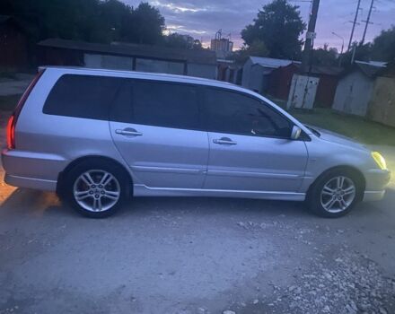 Серый Мицубиси Лансер, объемом двигателя 2 л и пробегом 250 тыс. км за 4058 $, фото 1 на Automoto.ua