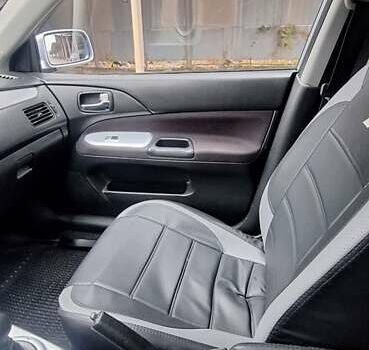 Серый Мицубиси Лансер, объемом двигателя 1.58 л и пробегом 223 тыс. км за 3200 $, фото 10 на Automoto.ua