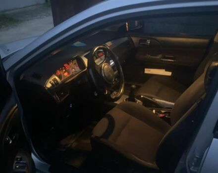 Серый Мицубиси Лансер, объемом двигателя 2 л и пробегом 250 тыс. км за 4058 $, фото 4 на Automoto.ua