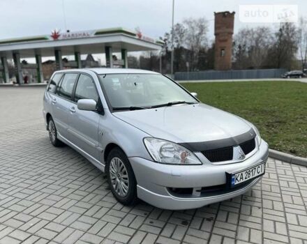 Сірий Міцубісі Lancer, об'ємом двигуна 1.6 л та пробігом 250 тис. км за 4300 $, фото 20 на Automoto.ua