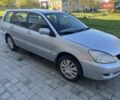 Серый Мицубиси Лансер, объемом двигателя 1.58 л и пробегом 276 тыс. км за 3700 $, фото 1 на Automoto.ua