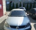 Сірий Міцубісі Lancer, об'ємом двигуна 1.58 л та пробігом 500 тис. км за 2100 $, фото 1 на Automoto.ua