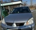 Сірий Міцубісі Lancer, об'ємом двигуна 1.6 л та пробігом 311 тис. км за 3800 $, фото 1 на Automoto.ua