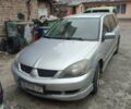 Сірий Міцубісі Lancer, об'ємом двигуна 2 л та пробігом 242 тис. км за 3500 $, фото 1 на Automoto.ua