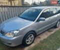 Сірий Міцубісі Lancer, об'ємом двигуна 1.58 л та пробігом 242 тис. км за 3900 $, фото 1 на Automoto.ua