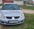 Серый Мицубиси Лансер, объемом двигателя 1.6 л и пробегом 185 тыс. км за 4700 $, фото 1 на Automoto.ua