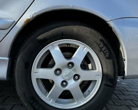 Сірий Міцубісі Lancer, об'ємом двигуна 1.6 л та пробігом 311 тис. км за 3800 $, фото 1 на Automoto.ua