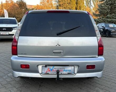 Серый Мицубиси Лансер, объемом двигателя 1.6 л и пробегом 203 тыс. км за 3500 $, фото 5 на Automoto.ua