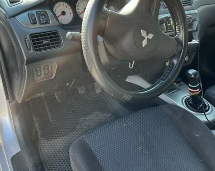 Сірий Міцубісі Lancer, об'ємом двигуна 1.6 л та пробігом 311 тис. км за 3800 $, фото 4 на Automoto.ua