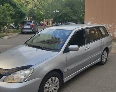Серый Мицубиси Лансер, объемом двигателя 1.6 л и пробегом 220 тыс. км за 4550 $, фото 2 на Automoto.ua