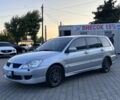 Серый Мицубиси Лансер, объемом двигателя 1.6 л и пробегом 203 тыс. км за 3500 $, фото 2 на Automoto.ua
