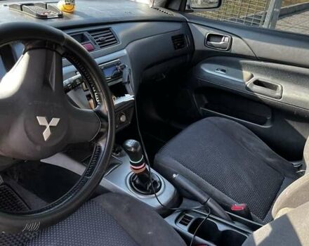 Сірий Міцубісі Lancer, об'ємом двигуна 1.6 л та пробігом 311 тис. км за 3800 $, фото 3 на Automoto.ua