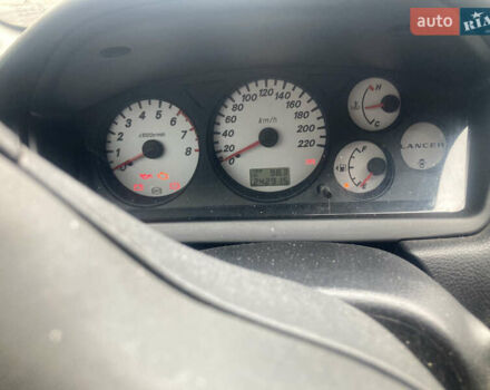 Сірий Міцубісі Lancer, об'ємом двигуна 1.58 л та пробігом 247 тис. км за 4350 $, фото 6 на Automoto.ua