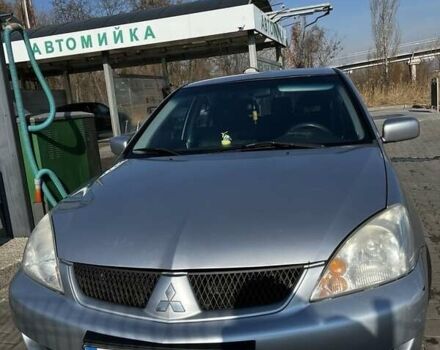 Сірий Міцубісі Lancer, об'ємом двигуна 1.6 л та пробігом 311 тис. км за 3800 $, фото 11 на Automoto.ua