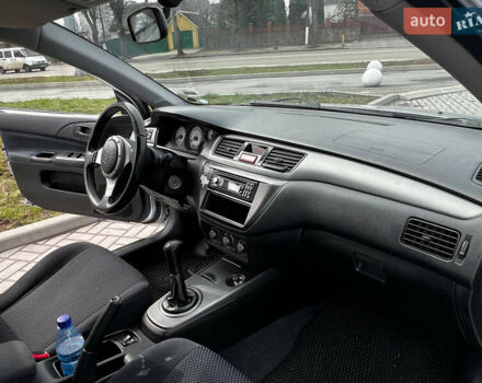Серый Мицубиси Лансер, объемом двигателя 1.58 л и пробегом 260 тыс. км за 4200 $, фото 2 на Automoto.ua